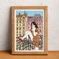 A domestic scene opens onto the outside world from a balcony, creating a small pause between home and city, illustrated print by Ana Jarén