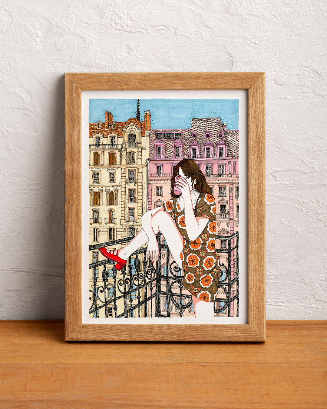 A domestic scene opens onto the outside world from a balcony, creating a small pause between home and city, illustrated print by Ana Jarén