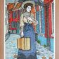 María Lejárraga arrive en Belgique sous la pluie, valise à la main, œuvre originale d’Ana Jarén.