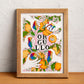 Seville is reimagined through rainbow colours, oranges, orange blossom and other recognisable elements of the city, illustrated print by Ana Jarén