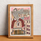 A figure looks out over the city of Paris from a rooftop, surrounded by architecture and the lines of the buildings, illustrated print by Ana Jarén