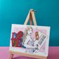 Portrait pop de Taylor Swift avec un panneau inspiré de The Eras Tour et une sculpture LOVE colorée, œuvre originale d’Ana Jarén.