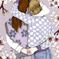 Two women embrace beneath a flowering almond tree, surrounded by branches and delicate blossoms, illustrated print by Ana Jarén